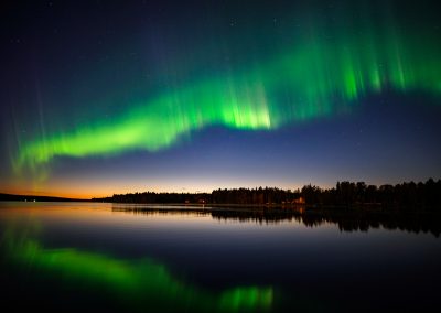 Northern Lights dancing in the sky above Lapland