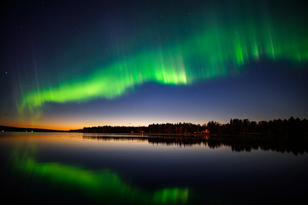 Northern Lights dancing in the sky above Lapland Northern Lights dancing in the sky above Lapland