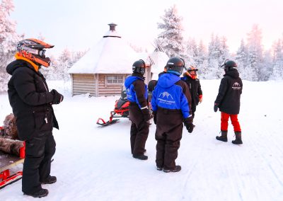 Family Sledge Snowmobile Ride in Rovaniemi